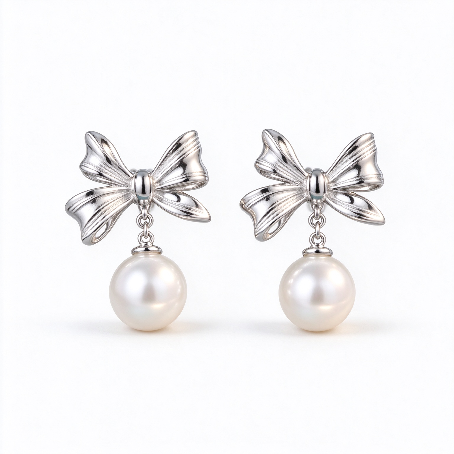silver-bow-pearl-drop-earrings